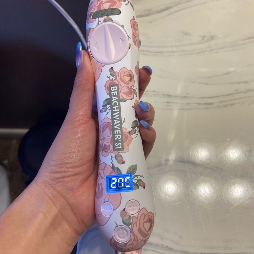 Brand new beach waver curling iron. I do not have the box anymore.